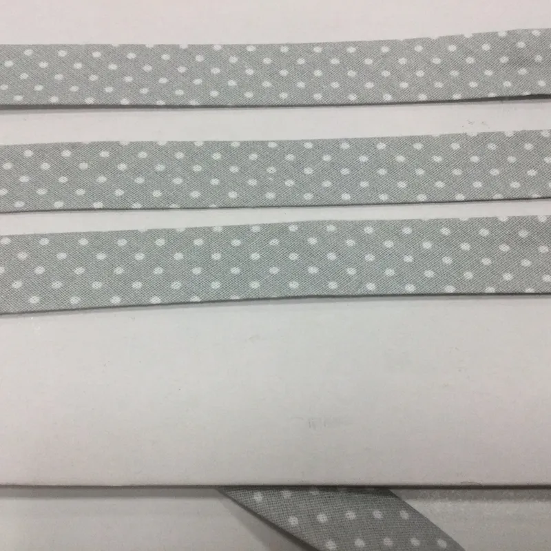 Galantéria, Šikmé prúžky, Vzorované - Šikmý prúžok bavlna 20mm sivá+biele bodky